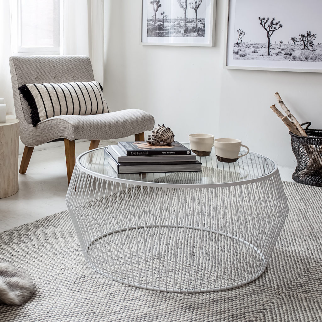 Close up of White Cyclone Coffee Table with Bailey Chairs