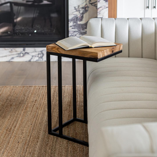 Natura C Table Natural – Living Room Natura C Table beside a sofa with an open book