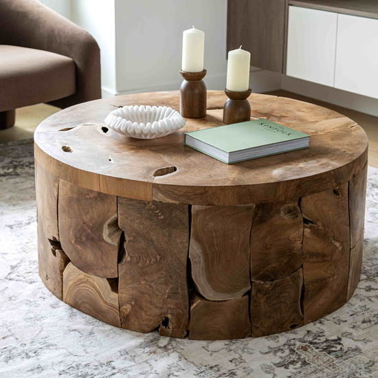 Natura Flow Round Coffee Table in Natural finish in a living room
